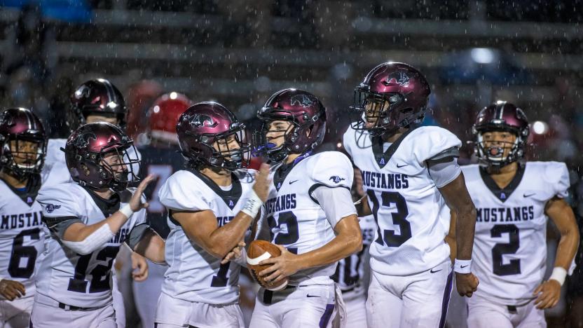 BRENTWOOD, TN - AUGUST 21:  Members of Lipscomb Academy celebrate during a football game against Brentwood Academy on August 21, 2020 in Brentwood, Tennessee. High school football restarted this week across most of Tennessee despite the coronavirus (COVID-19) pandemic still affecting many parts of the world.  