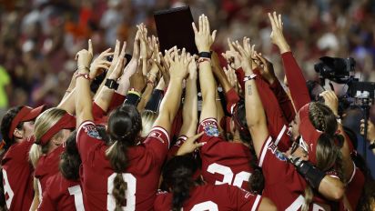 Getty Images - OKLAHOMA CITY, OKLAHOMA - JUNE 06: The Oklahoma Sooners lift the national championship trophy following their 8-4 win over the Texas Longhorns during game two of the Division I Softball Championship held at Devon Park on June 6, 2024 in Oklahoma City, Oklahoma. (Photo by Brendall O'Banon/NCAA Photos via Getty Images)