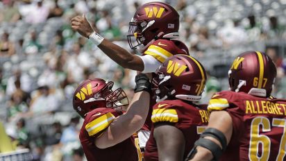 Associated Press - Washington Commanders quarterback Jayden Daniels (5) reacts after rushing for a touchdown against the New York Jets during a pre-season NFL football game Saturday, Aug. 10, 2024, in East Rutherford, N.J. (AP Photo/Adam Hunger)