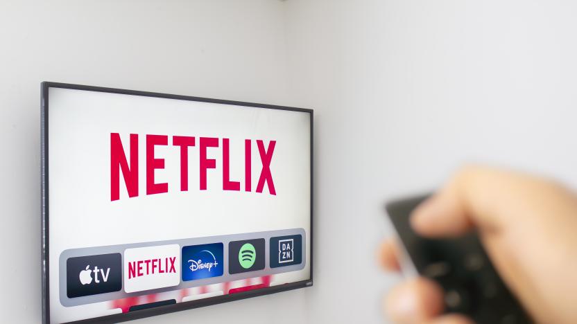 Calgary, Alberta. Canada Dec 9 2019: A Person holds an Apple TV remote using the new Netflix app with a hand. Netflix dominates Golden Globe Nominations. Illustrative