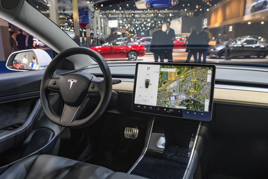 BRUSSELS, BELGIUM - JANUARY 09: Tesla Model 3 compact full electric car interior with a large touch screen on the dashboard on display at Brussels Expo on January 9, 2020 in Brussels, Belgium. The Model 3 is fitted with a full self-driving system. (Photo by Sjoerd van der Wal/Getty Images)