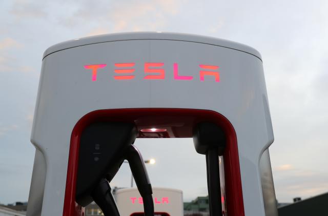 A Tesla Supercharger station is seen in Dietikon, Switzerland October 21, 2020. REUTERS/Arnd Wiegmann