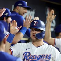 Texas Rangers legend Ian Kinsler wears Team Israel jersey during