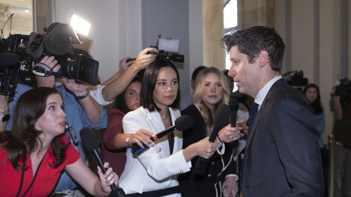 OpenAI CEO Sam Altman, maker of ChatGPT, is met by reporters as Senate Majority Leader Chuck Schumer, D, N.Y., convenes a closed-door gathering of leading tech CEOs to discuss the priorities and risks surrounding artificial intelligence and how it should be regulated, at the Capitol in Washington, Wednesday, Sept. 13, 2023. (AP Photo/J. Scott Applewhite)