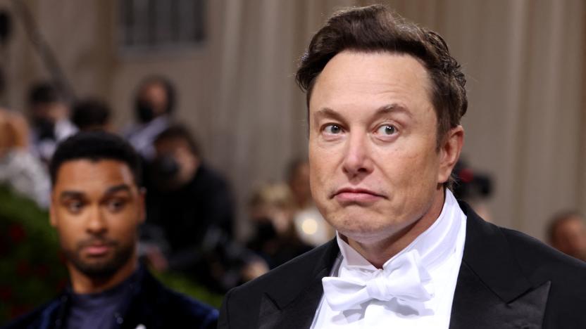 Rege-Jean Page looks at Elon Musk as they arrive at the In America: An Anthology of Fashion themed Met Gala at the Metropolitan Museum of Art in New York City, New York, U.S., May 2, 2022. REUTERS/Andrew Kelly