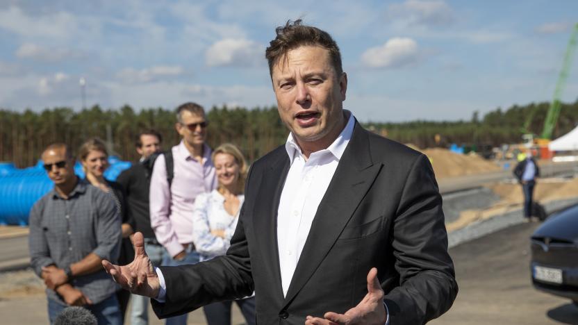 FUERSTENWALDE, GERMANY - SEPTEMBER 03: Tesla head Elon Musk talks to the press as he arrives to have a look at the construction site of the new Tesla Gigafactory near Berlin on September 03, 2020 near Gruenheide, Germany. Musk is currently in Germany where he met with vaccine maker CureVac on Tuesday, with which Tesla has a cooperation to build devices for producing RNA vaccines, as well as German Economy Minister Peter Altmaier yesterday. (Photo by Maja Hitij/Getty Images)