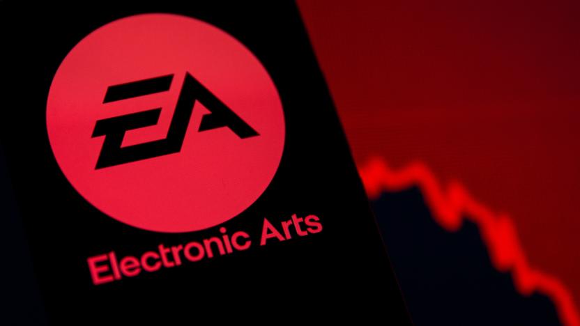 A smartphone with the Electronic Arts logo is seen in front of a displayed stock graph in this illustration taken September 16, 2021. REUTERS/Dado Ruvic/Illustration