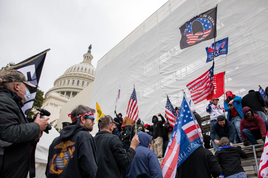 WASHINGTON DC - JANUARY 6: Flags fly near the U.S. Capitol as the perimeter was breached by pro-Trump protestors in Washington, DC on Wednesday, January 6, 2021. (Amanda Andrade-Rhoades/For The Washington Post via Getty Images)