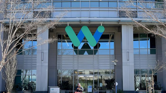 MOUNTAIN VIEW, CALIFORNIA - MARCH 01: A sign is posted on the exterior of a Waymo office on March 01, 2023 in Mountain View, California. Waymo, Alphabet's self-driving car division, announced that it has laid off over 135 employees in a second round of layoffs this year. Waymo has cut 8 percent of its workforce this year. (Photo by Justin Sullivan/Getty Images)