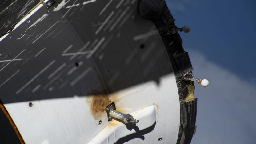 A view shows external damage believed to have caused a loss of pressure in the cooling system of the Soyuz MS-22 spacecraft docked to the International Space Station (ISS), in this image released February 13, 2023. Roscosmos/Handout via REUTERS ATTENTION EDITORS - THIS IMAGE HAS BEEN SUPPLIED BY A THIRD PARTY. MANDATORY CREDIT.