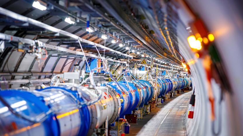 TOSome of the 1232 dipole magnets that bend the path of accelerated protons are pictured in the Large Hadron Collider (LHC) in a tunnel of the European Organisation for Nuclear Research (CERN), during maintenance works on February 6, 2020 in Echenevex, France, near Geneva. - Six years after the historic discovery of the Higgs boson, the world's largest particle accelerator is taking a break to boost its power, hoping to find new particles that would explain, among other things, dark matter, one of the great enigmas of the Universe. (Photo by VALENTIN FLAURAUD / AFP) (Photo by VALENTIN FLAURAUD/AFP via Getty Images)