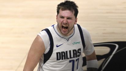 Getty Images - Los Angeles, CA - April 23:  Luka Doncic #77 of the Dallas Mavericks reacts after hitting a three pointer against the LA Clippers in the fourth quarter of game 2 of a first round playoff NBA basketball game at Crypto.com Arena in Los Angeles on Tuesday, April 23, 2024. (Photo by Keith Birmingham/MediaNews Group/Pasadena Star-News via Getty Images)