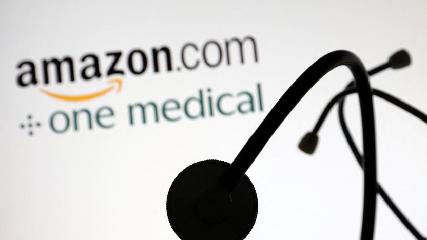 A stethoscope is placed on displayed Amazon.com and One Medical logos in this illustration taken July 26, 2022. REUTERS/Dado Ruvic/Illustration