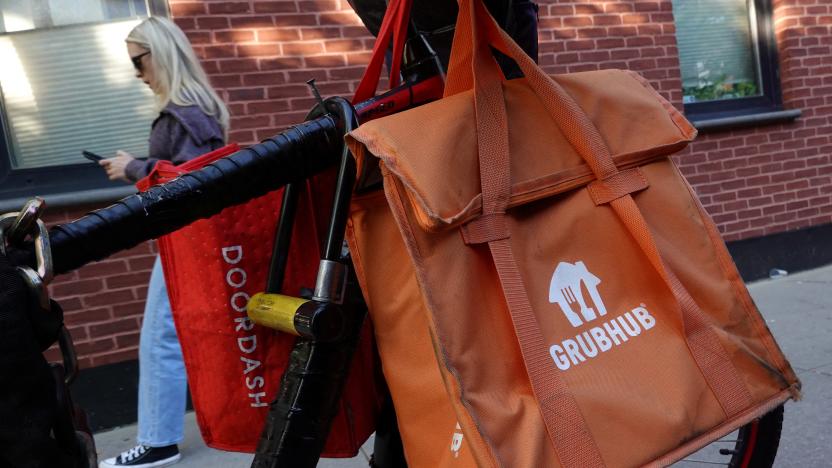 Doordash and Grubhub delivery bags are seen on a bicycle in Brooklyn, New York City, U.S., May 9, 2022. REUTERS/Andrew Kelly