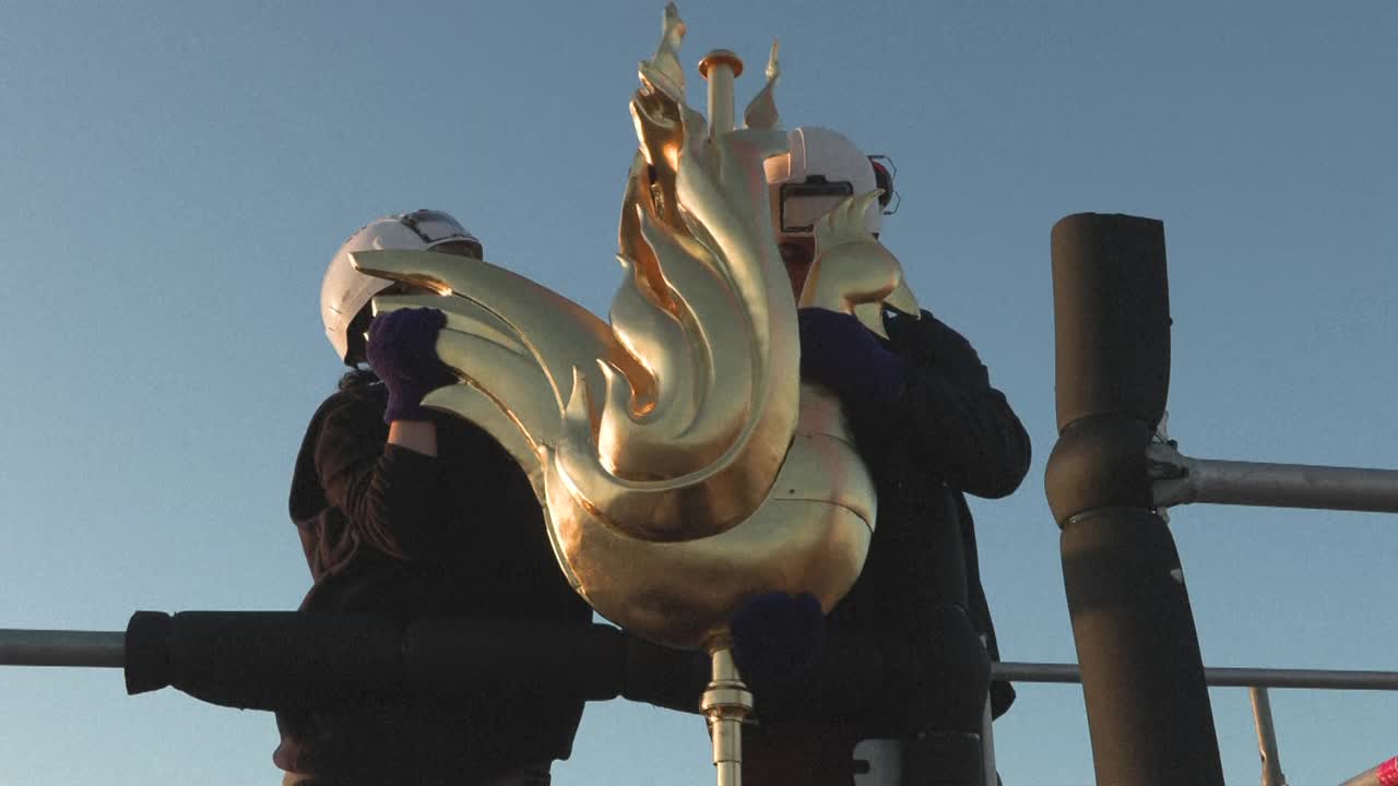 New Golden Rooster Fitted To Spire Of Paris' Notre Dame Cathedral