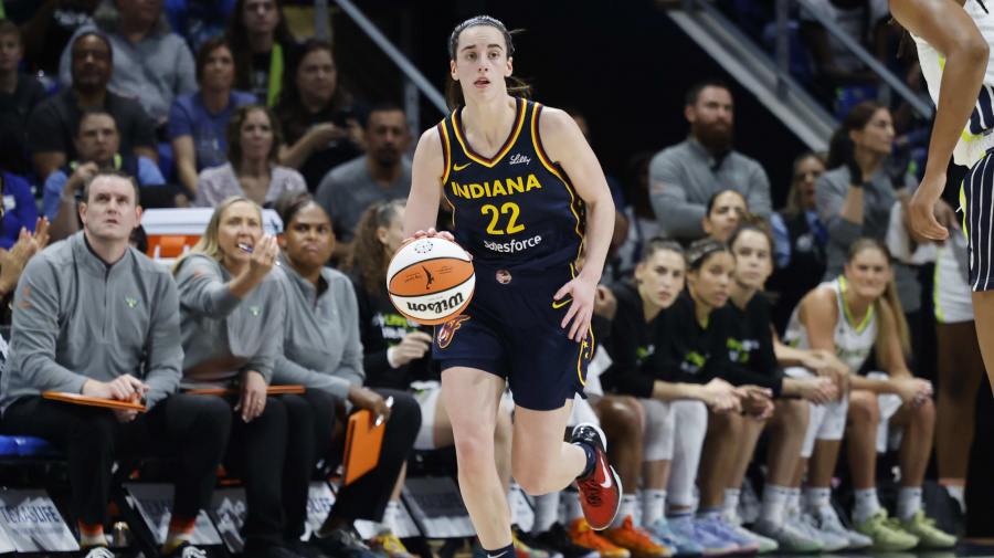 Associated Press - Indiana Fever guard Caitlin Clark (22) moves upcourt against the Dallas Wings during the first half of an WNBA basketball game in Arlington, Texas, Friday, May 3, 2024. (AP Photo/Michael Ainsworth)