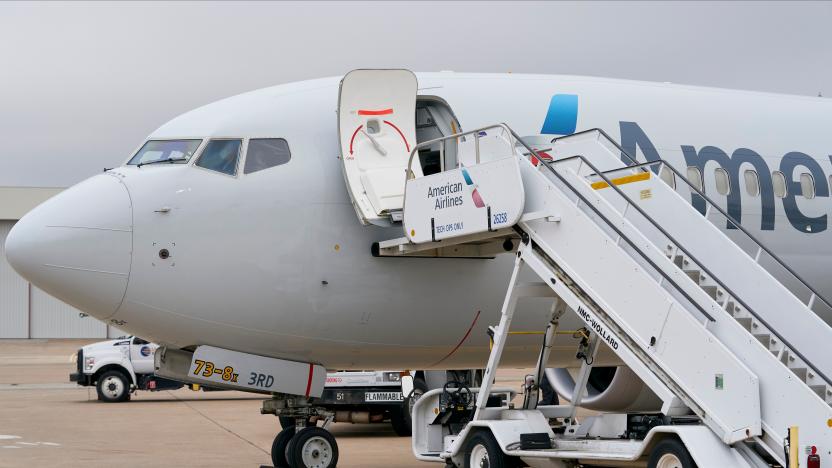 An exterior view of an American Airlines B737 MAX airplane is seen at Dallas-Forth Worth International Airport in Dallas, Texas on December 2, 2020. - The Boeing 737 MAX will take another key step in its comeback to commercial travel on December 2, 2020 by attempting to reassure the public with a test flight by American Airlines conducted for the news media. After being grounded for 20 months following two deadly crashes, US air safety officials in mid-November cleared the MAX to return to service following changes to the plane and pilot training protocols. (Photo by Cooper NEILL / AFP) (Photo by COOPER NEILL/AFP via Getty Images)