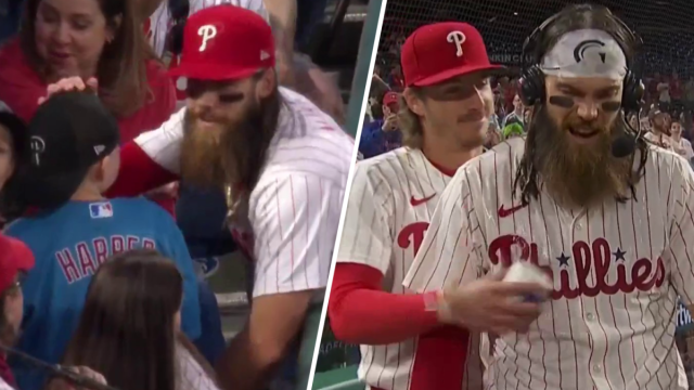 Brandon Marsh reacts to his interaction with this young Phillies fan