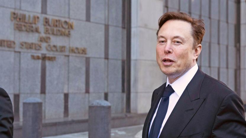 FILE - Elon Musk leaves the Phillip Burton Federal Building and United States Court House in San Francisco, Tuesday, Jan. 24, 2023. A federal appeals court Friday, July 21, said it will reconsider its March ruling that Musk unlawfully threatened employees with a loss of stock options in a 2018 Twitter post amid an organizing effort by the United Auto Workers union.