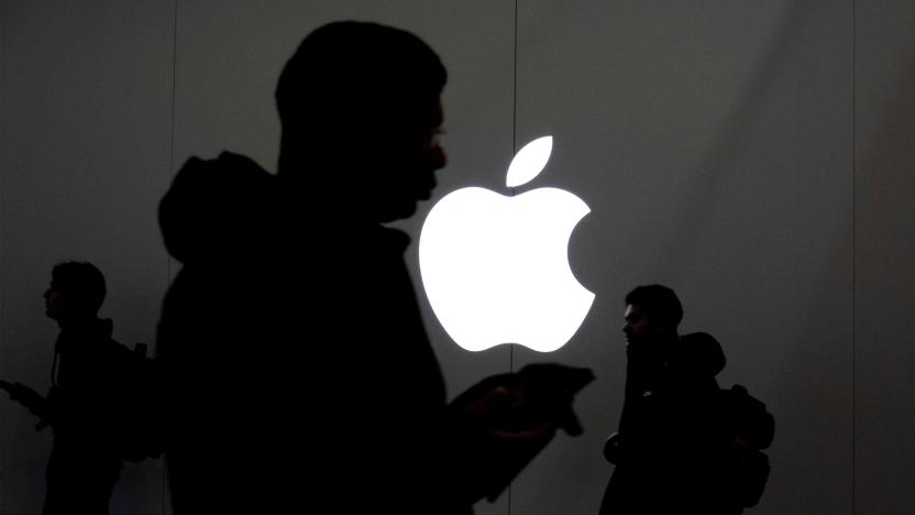 People walk past the Apple Store in the Eaton Centre in Toronto, Ontario, Canada November 22, 2022.  REUTERS/Carlos Osorio