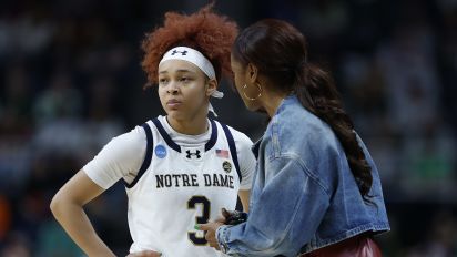 Getty Images - ALBANY, NEW YORK - MARCH 29: Hannah Hidalgo #3 of the Notre Dame Fighting Irish speaks to head coach Niele Ivey against the Oregon State Beavers during the second half in the Sweet 16 round of the NCAA Women's Basketball Tournament at MVP Arena on March 29, 2024 in Albany, New York. (Photo by Sarah Stier/Getty Images)