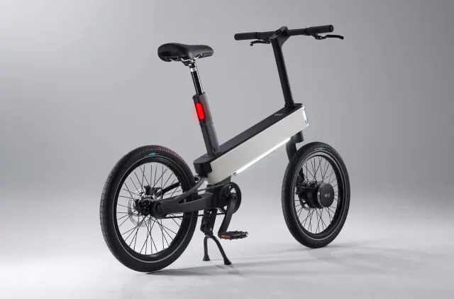 The Acer ebii e-bike is back and gray with a red light in the back. 