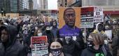 Protesters rally outside the Third Precinct in Minneapolis on April 19. (Morry Gash/AP)