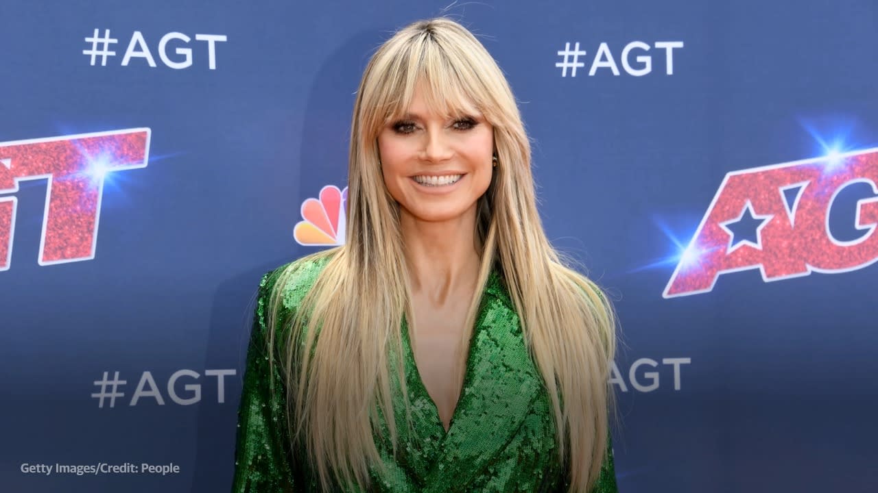 AGT's Heidi Klum shows off her bare butt in tiny thong bikini as she holds  hands with husband Tom on the beach