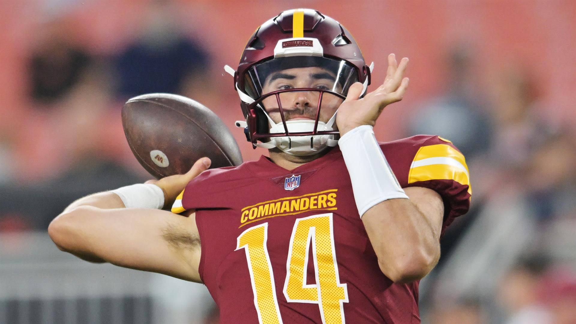 Commanders QB Sam Howell is using a Riddell Axiom with an AXIOM-2B-SW-Ti  facemask, clear visor and a Riddell hardcup chinstrap paired with…