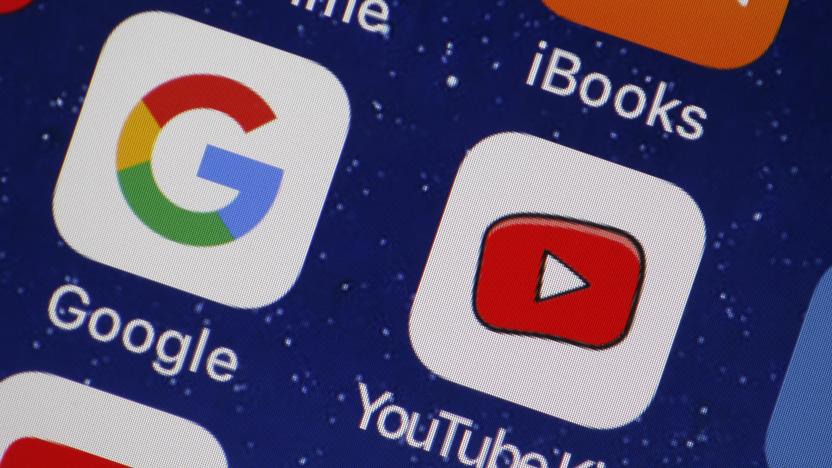 PARIS, FRANCE - APRIL 10:  In this photo illustration, the logo of the Google and You Tube Kids applications are displayed on the screen of an Apple iPhone on April 10, 2018 in Paris, France. Twenty-three US digital rights and child protection organizations have accused YouTube and its parent company Google of collecting personal data about children and using it to target advertisements, a complaint has been filed with the FTC, the US trade regulator.  (Photo by Chesnot/Getty Images)