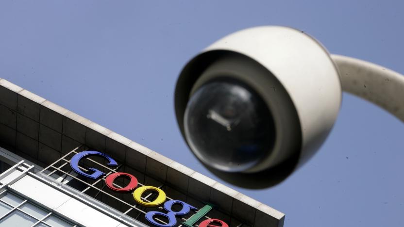 The Google logo is seen on the top of its China headquarters building behind a road surveillance camera in Beijing January 26, 2010. Chinese state media stepped up their war of words with the United States over Internet control on Tuesday, with a top newspaper claiming a U.S. conspiracy and saying China can live without Google. This logo has been updated and is no longer in use. 
 REUTERS/Jason Lee(CHINA - Tags: BUSINESS POLITICS SCI TECH)