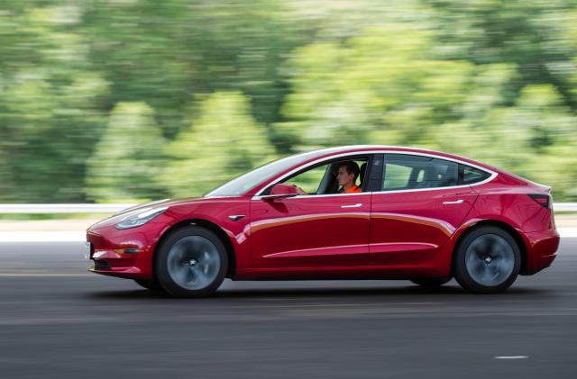 Joe Young, media relations associate for the Insurance Institute for Highway Safety (IIHS), drives a 2018 Tesla Model 3 at the IIHS-HLDI Vehicle Research Center in Ruckersville, Virginia, U.S., July 22, 2019.  Picture taken July 22, 2019. REUTERS/Amanda Voisard