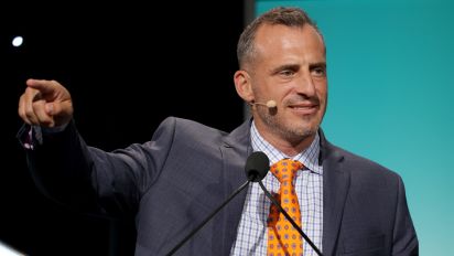 Getty Images - BEVERLY HILLS, CALIFORNIA - AUGUST 18: Doug Gottlieb speaks onstage during the Harold & Carole Pump Foundation 2023 Gala at The Beverly Hilton on August 18, 2023 in Beverly Hills, California. (Photo by Tiffany Rose/Getty Images for Harold & Carole Pump Foundation)