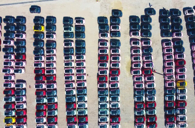 WUHU, CHINA - OCTOBER 13: Aerial view of Chery eQ1, or Little Ant in Chinese, electric cars sitting parked at a factory of Chery New Energy Automobile Co., Ltd on October 13, 2022 in Wuhu, Anhui Province of China. (Photo by Wang Yushi/VCG via Getty Images)