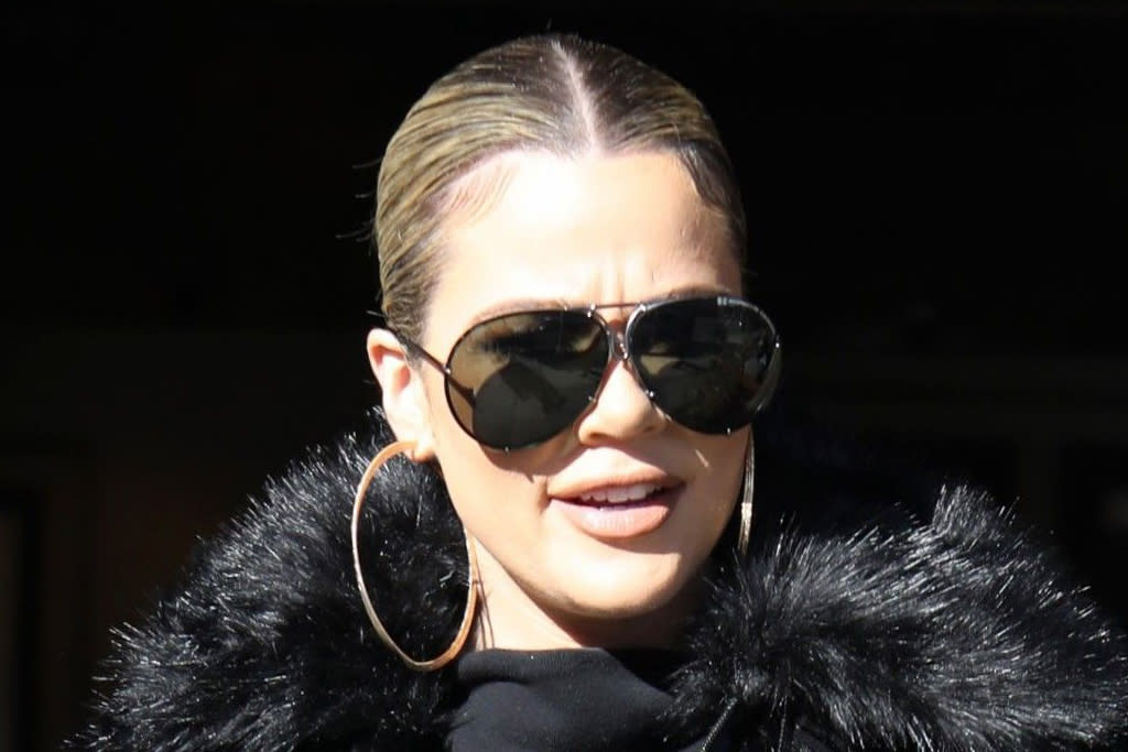 Khloe Kardashian Wows in new high boots and Athleisure for Good American