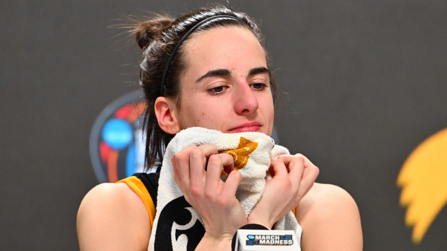 Getty Images - CLEVELAND, OHIO - APRIL 07: Caitlin Clark #22 of the Iowa Hawkeyes speaks to the media after losing to the South Carolina Gamecocks in the 2024 NCAA Women's Basketball Tournament National Championship at Rocket Mortgage FieldHouse on April 07, 2024 in Cleveland, Ohio. South Carolina beat Iowa 87-75. (Photo by Jason Miller/Getty Images)