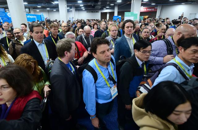 A crowd makes their way through the showroom floor at the 2017 Consumer Electronics Show in Las Vegas, Nevada, on January 5, 2017.  / AFP / Frederic J. BROWN        (Photo credit should read FREDERIC J. BROWN/AFP via Getty Images)