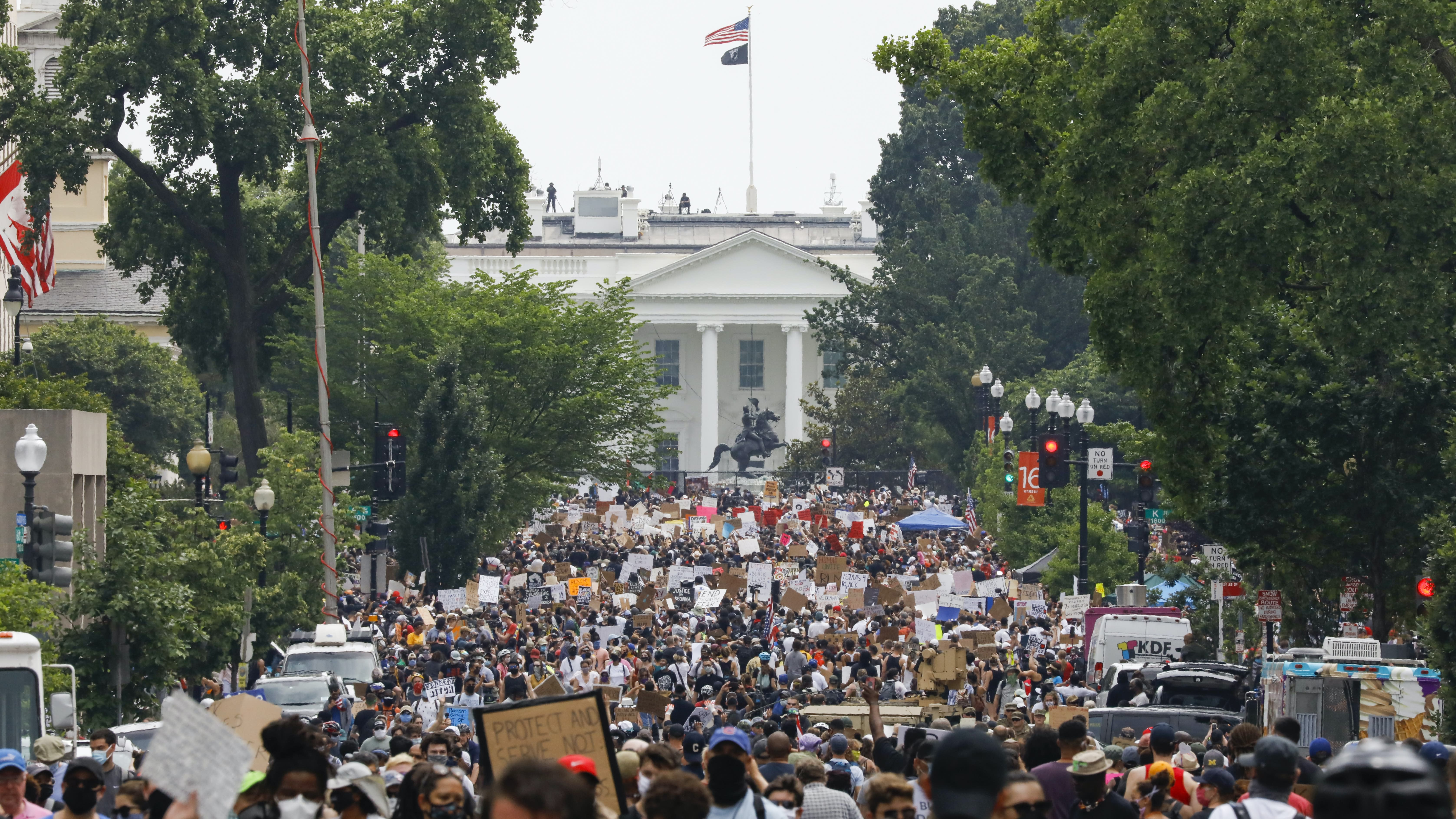 Protesters pour into Washington DC for city’s largest demonstration yet