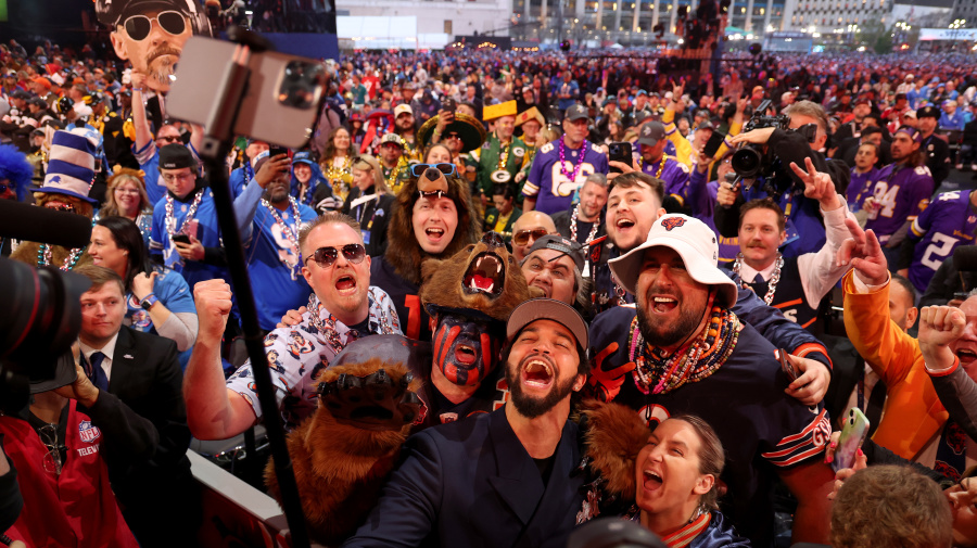 Getty Images - DETROIT, MICHIGAN - APRIL 25: Caleb Williams celebrates with fans after being selected first overall by the Chicago Bears during the first round of the 2024 NFL Draft at Campus Martius Park and Hart Plaza on April 25, 2024 in Detroit, Michigan. (Photo by Gregory Shamus/Getty Images)