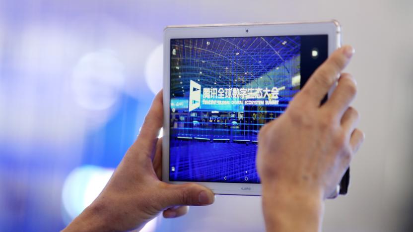 KUNMING, CHINA - MAY 23: A visitor uses Huawei iPad to take photos during the Tencent Global Digital Ecosystem Summit at Dianchi International Convention and Exhibition Center on May 23, 2019 in Kunming, Yunnan Province of China. The Tencent Global Digital Ecosystem Summit is held on May 21-23 in Kunming. (Photo by Visual China Group via Getty Images/Visual China Group via Getty Images)