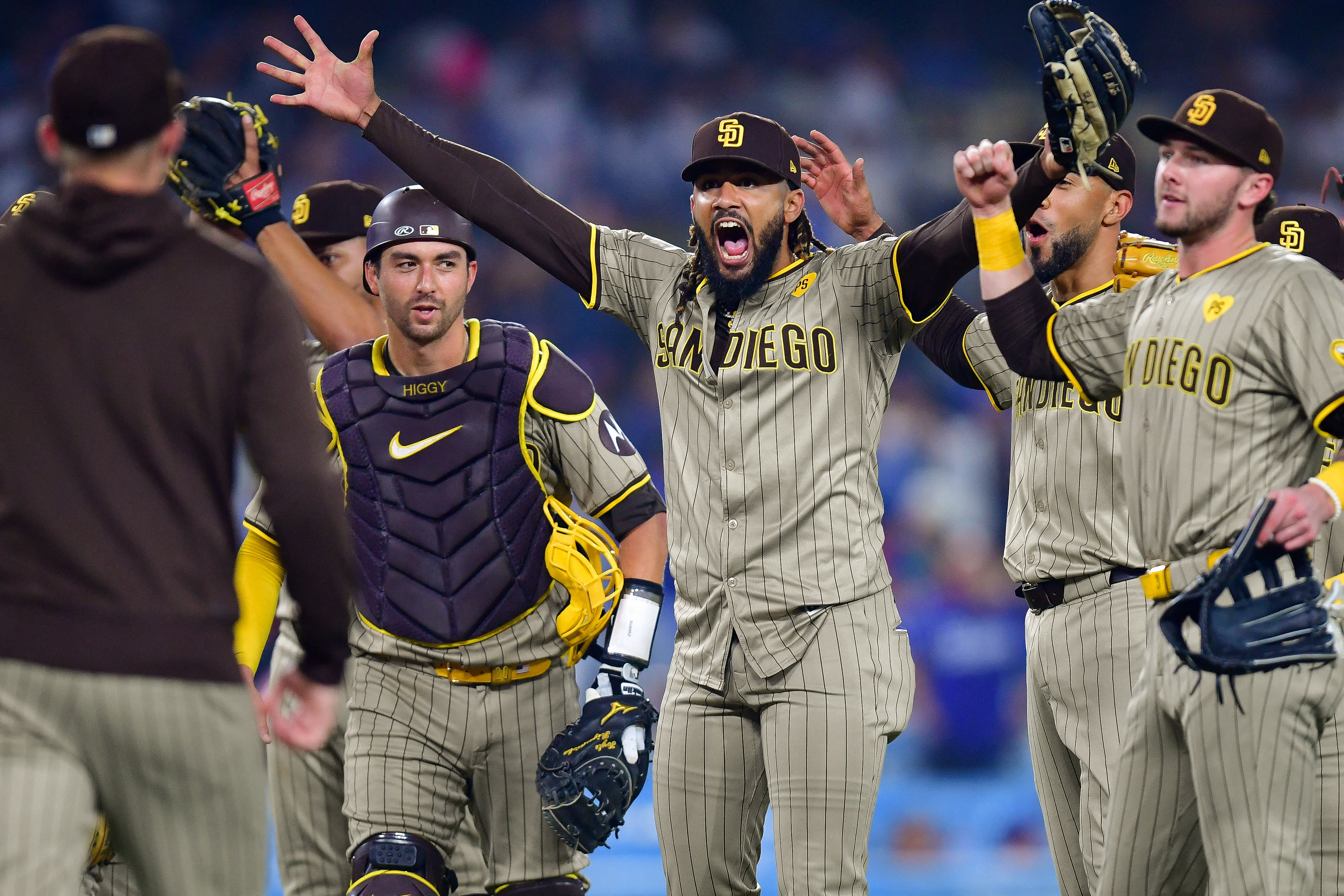 Triple the fun: Padres clinch playoff spot in craziest of ways