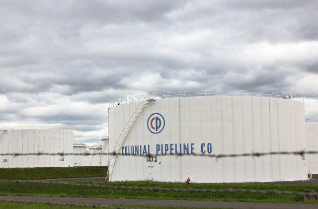 WOODBRIDGE, NEW JERSEY - MAY 10: Fuel holding tanks are seen at Colonial Pipeline's Linden Junction Tank Farm on May 10, 2021 in Woodbridge, New Jersey. Alpharetta, Georgia-based Colonial Pipeline, which has the largest fuel pipeline, was forced to shut down its oil and gas pipeline system on Friday after a ransomware attack that has slowed down the transportation of oil in the eastern U.S. On Sunday, the federal government announced an emergency declaration that extends through June 8th and can be renewed. On Monday, the FBI confirmed that the cyberattack was carried out by DarkSide, a cybercrime gang believed to operate out of Russia. (Photo by Michael M. Santiago/Getty Images)