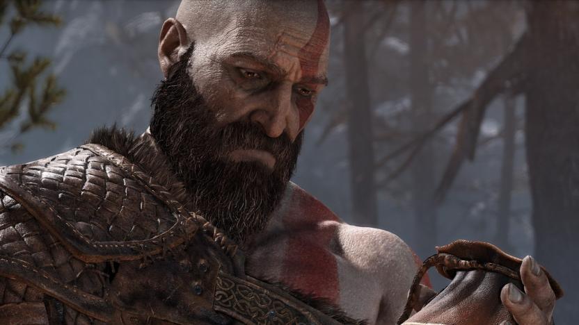 Screenshot of God of War's Kratos holding a bag of ashes. 