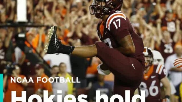 Virginia Tech holds on to beat West Virginia 31-24