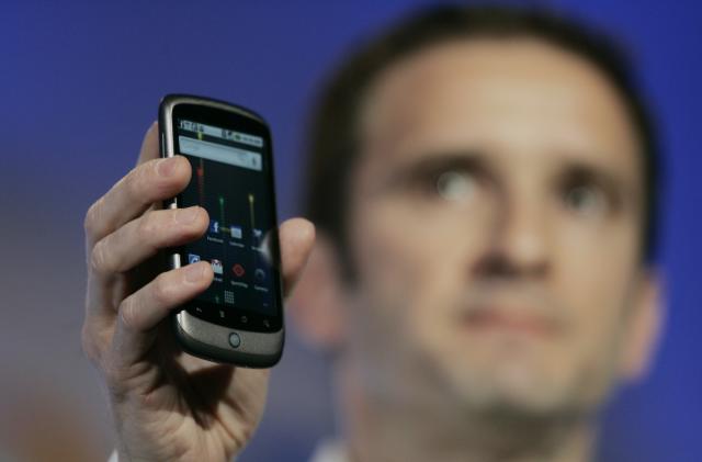 Mario Queiroz, Vice President of Product Management for Google, holds up the Nexus One smartphone running on the Google Android platform, the first mobile phone the internet company will sell directly to consumers, during a news conference at Google headquarters in Mountain View, California on January 5, 2010.    AFP PHOTO/Robert Galbraith/POOL (Photo by - / POOL / AFP)        (Photo credit should read -/AFP via Getty Images)