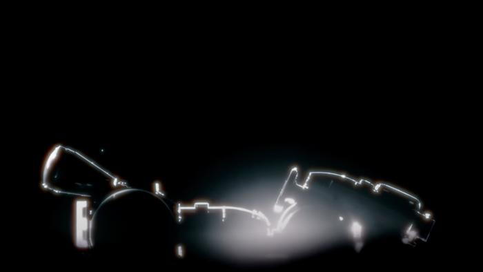 The illuminated outline of a Mario Kart kart is shown against a black background