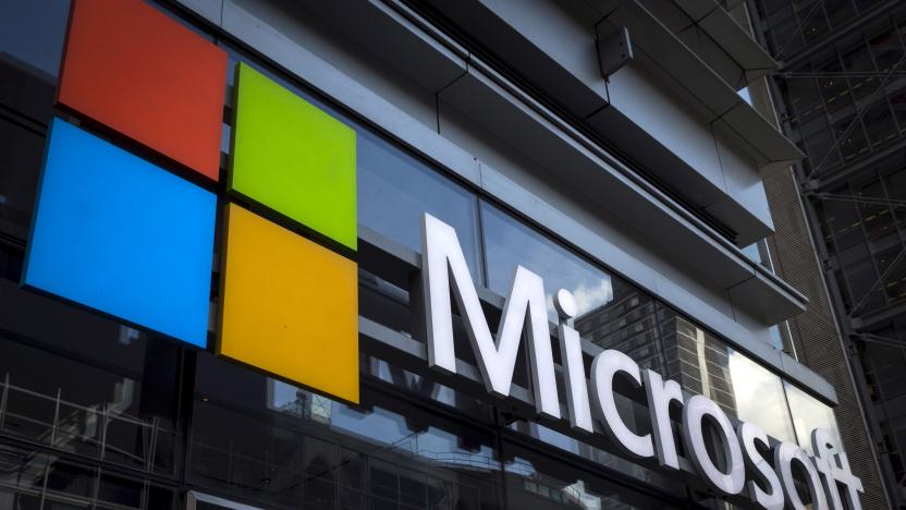 A Microsoft logo is seen on an office building in New York City in this July 28, 2015 file photo. Microsoft Corp announced more big cuts to its smartphone business on Wednesday.  REUTERS/Mike Segar/Files