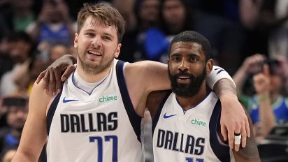 Getty Images - DALLAS, TEXAS - APRIL 07: Luka Doncic #77 and Kyrie Irving #11 of the Dallas Mavericks embrace after defeating the against the Houston Rockets in overtime at American Airlines Center on April 07, 2024 in Dallas, Texas. NOTE TO USER: User expressly acknowledges and agrees that, by downloading and or using this photograph, User is consenting to the terms and conditions of the Getty Images License Agreement. (Photo by Sam Hodde/Getty Images)