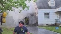 Video shows vehicle fire which spread to Norfolk home, displacing 4