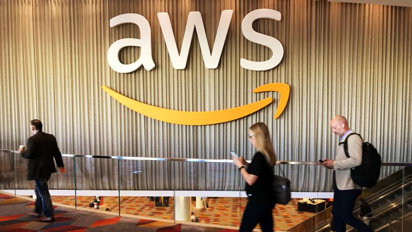 Attendees at Amazon.com Inc annual cloud computing conference walk past the Amazon Web Services logo in Las Vegas, Nevada, U.S., November 30, 2017.    REUTERS/Salvador Rodriguez